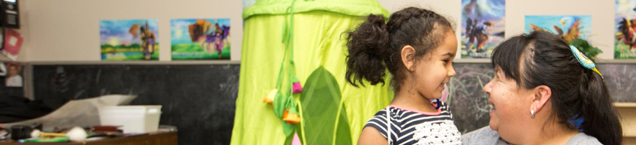 Young girl with a child care worker